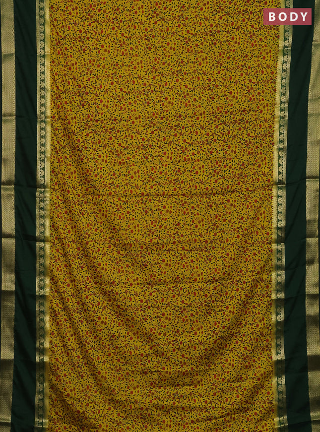 Semi mysore silk saree yellow and bottle green with allover floral prints and long rettapet zari woven border