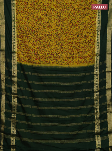 Semi mysore silk saree yellow and bottle green with allover floral prints and long rettapet zari woven border