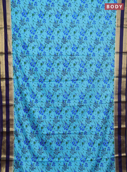 Semi mysore silk saree light blue and navy blue with allover floral prints and rettapet zari woven border