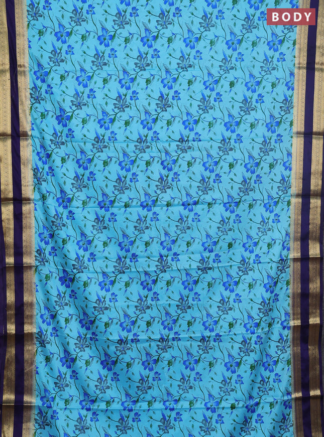 Semi mysore silk saree light blue and navy blue with allover floral prints and rettapet zari woven border