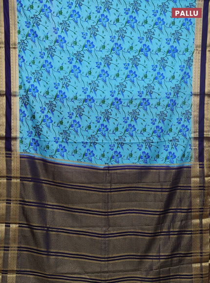 Semi mysore silk saree light blue and navy blue with allover floral prints and rettapet zari woven border