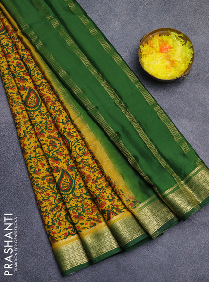 Semi mysore silk saree dark mustard and green with allover floral prints and zari woven border