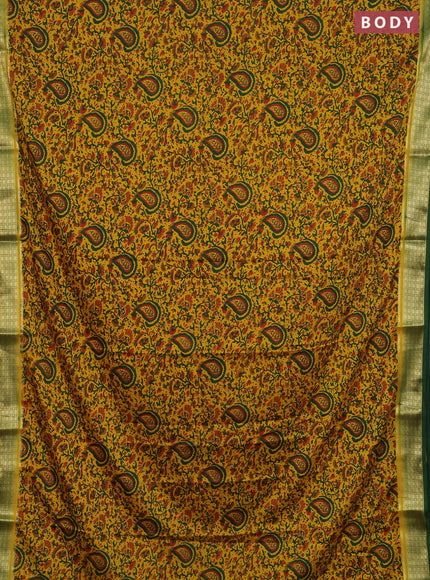 Semi mysore silk saree dark mustard and green with allover floral prints and zari woven border