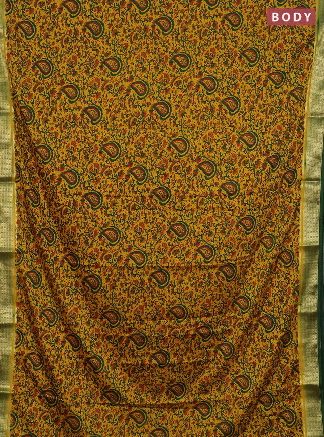 Semi mysore silk saree dark mustard and green with allover floral prints and zari woven border