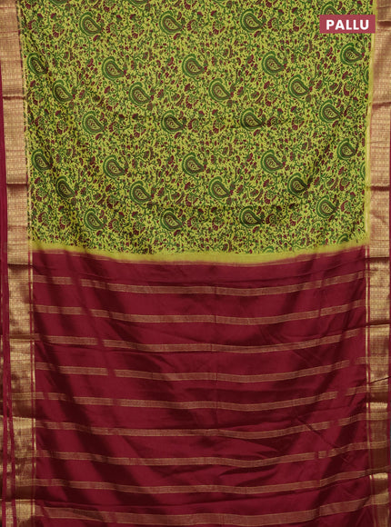 Semi mysore silk saree lime green and maroon with allover floral prints and zari woven border