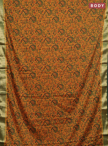 Semi mysore silk saree dark mustard and green with allover floral prints and zari woven border