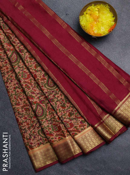 Semi mysore silk saree peach shade and wine shade with allover floral prints and zari woven border