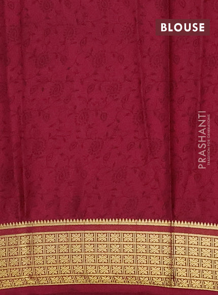 Semi mysore silk saree peach shade and wine shade with allover floral prints and zari woven border