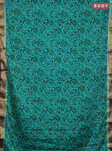 Semi mysore silk saree teal green and violet with allover floral prints and zari woven border