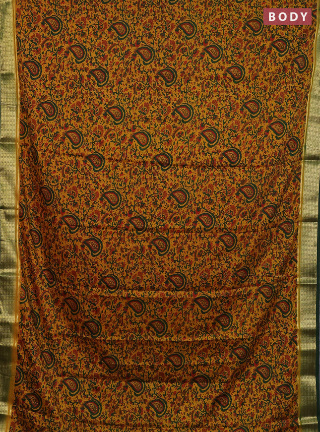 Semi mysore silk saree dark mustard and bottle green with allover floral prints and zari woven border