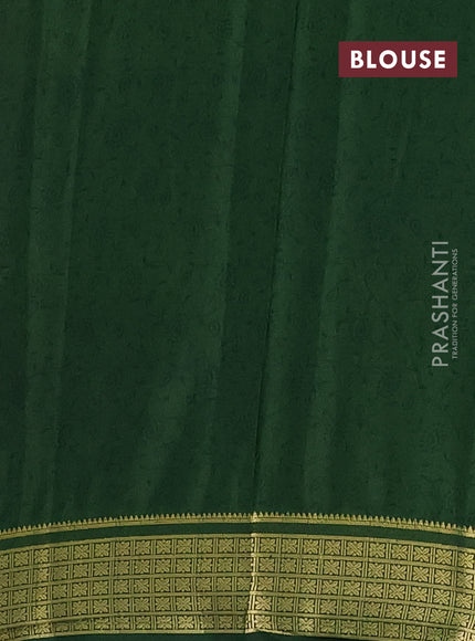 Semi mysore silk saree dark mustard and bottle green with allover floral prints and zari woven border