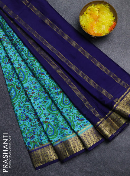 Semi mysore silk saree light blue and navy blue with allover floral prints and zari woven border