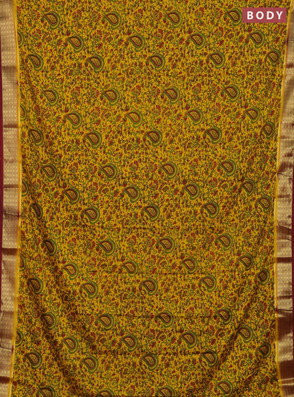 Semi mysore silk saree yellow and maroon with allover floral prints and zari woven border