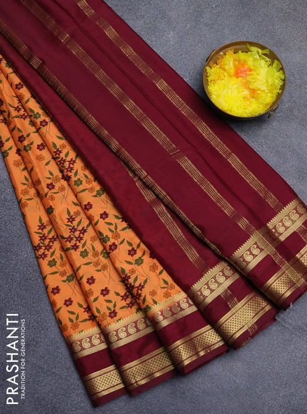 Semi mysore silk saree peach orange and wine shade with allover floral prints and rettapet zari woven border