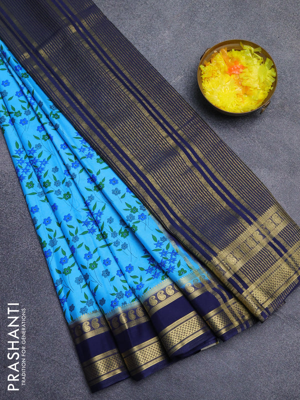 Semi mysore silk saree cs blue and navy blue with allover floral prints and rettapet zari woven border