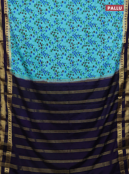 Semi mysore silk saree light blue and navy blue with allover floral prints and rettapet zari woven border