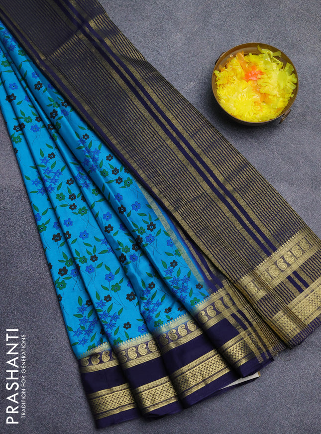 Semi mysore silk saree teal blue and navy blue with allover floral prints and rettapet zari woven border