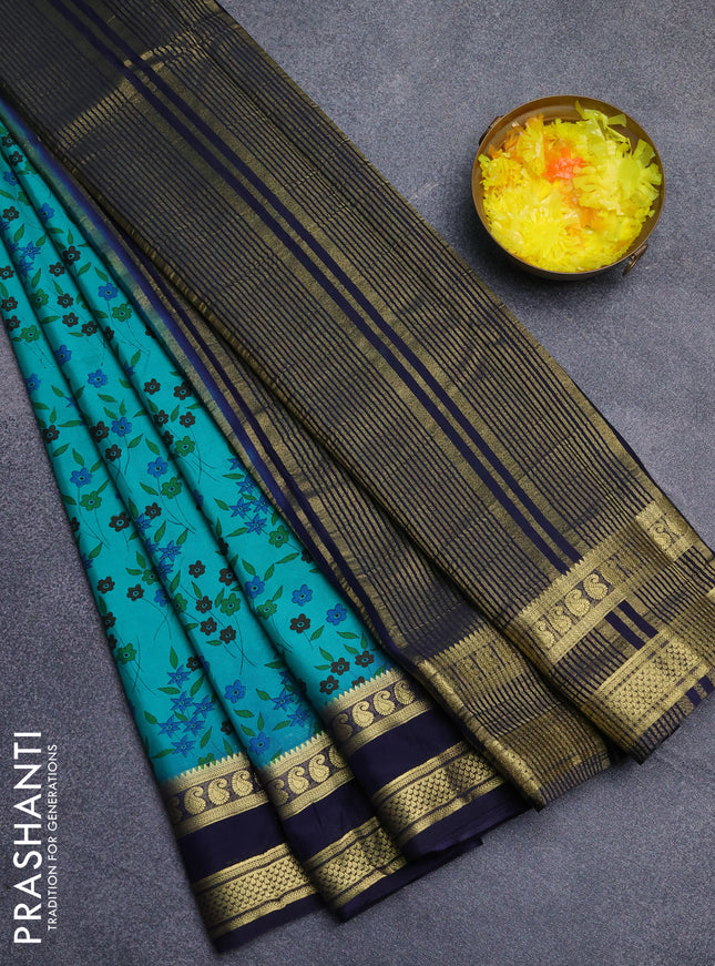 Semi mysore silk saree teal green and navy blue with allover floral prints and rettapet zari woven border