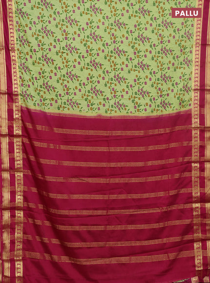 Semi mysore silk saree pista green and magenta pink with allover floral prints and rettapet zari woven border