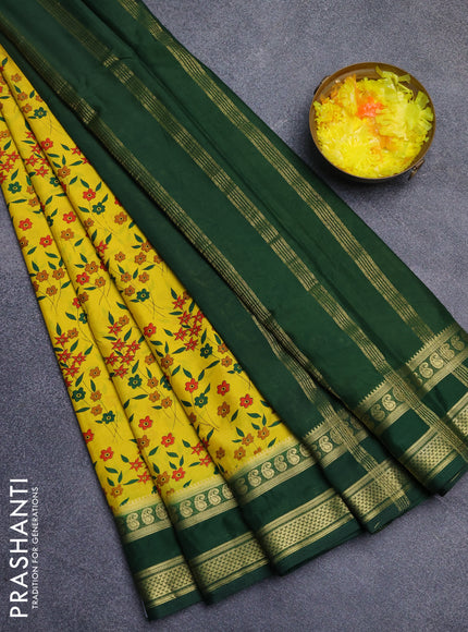 Semi mysore silk saree yellow and bottle green with allover floral prints and rettapet zari woven border