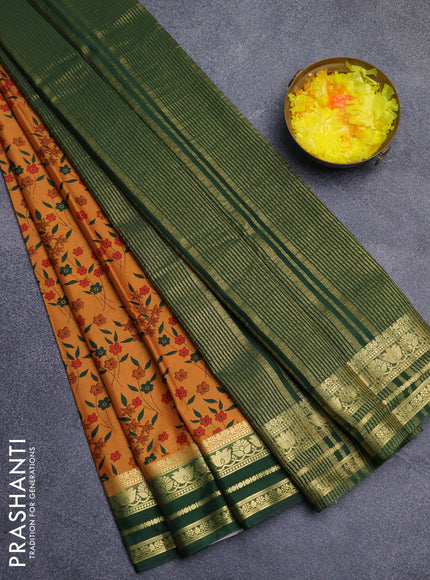 Semi mysore silk saree dark mustard and green with allover floral prints and zari woven border