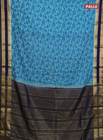 Semi mysore silk saree light blue and navy blue with allover floral prints and rettapet zari woven border