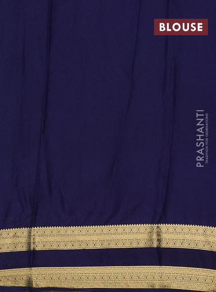 Semi mysore silk saree light blue and navy blue with allover floral prints and rettapet zari woven border