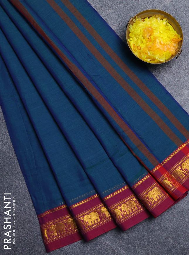Narayanpet cotton saree dual shade of bluish green and wine shade with plain body and elephant zari woven border