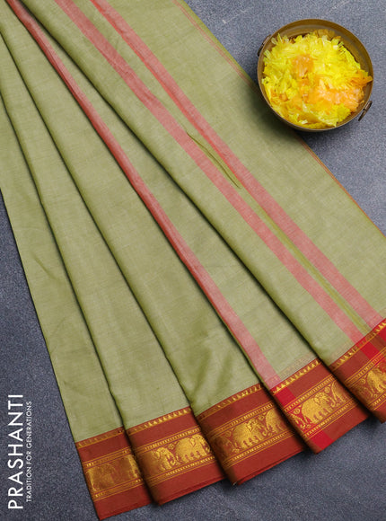Narayanpet cotton saree pista green and rust shade with plain body and elephant zari woven border
