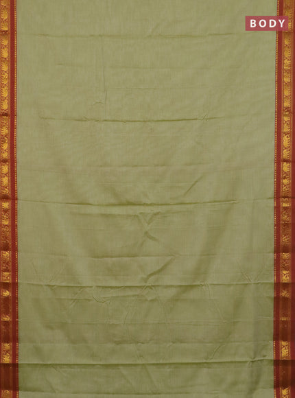 Narayanpet cotton saree pista green and rust shade with plain body and elephant zari woven border