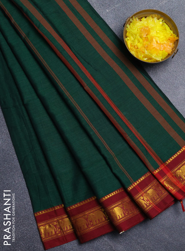 Narayanpet cotton saree bottle green and maroon with plain body and elephant zari woven border