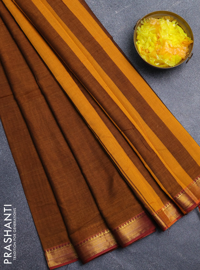 Narayanpet cotton saree dark mustard and maroon with plain body and zari woven border