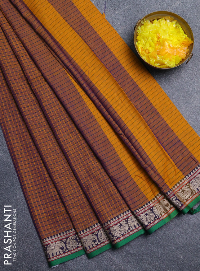Narayanpet cotton saree dual shade of rust and deep violet green with allover checked apttern and thread woven border