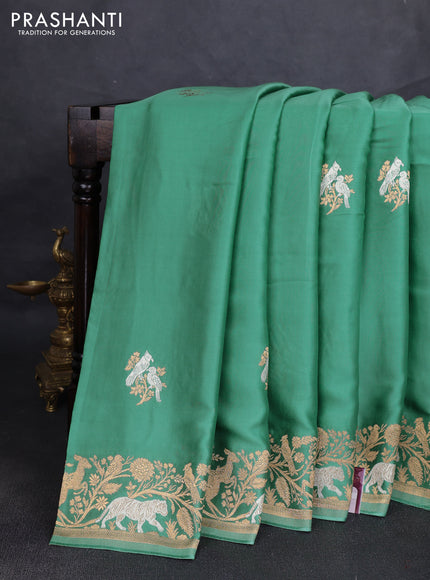Art mushru silk saree pastel green with silver & gold zari woven buttas and zari woven border