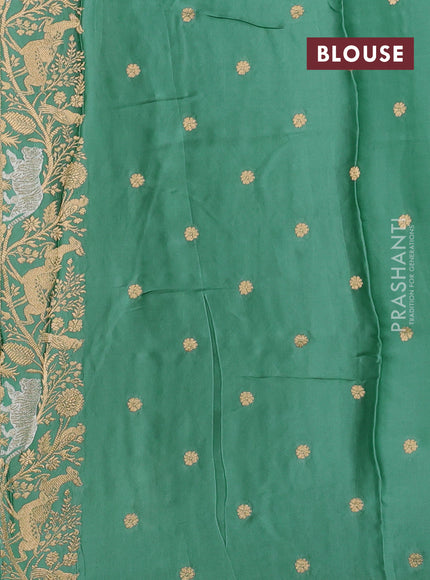 Art mushru silk saree pastel green with silver & gold zari woven buttas and zari woven border