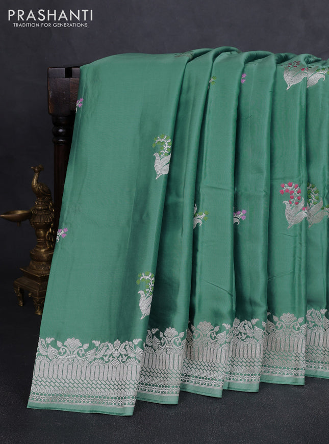 Art mushru silk saree teal green shade with zari woven buttas and zari woven border