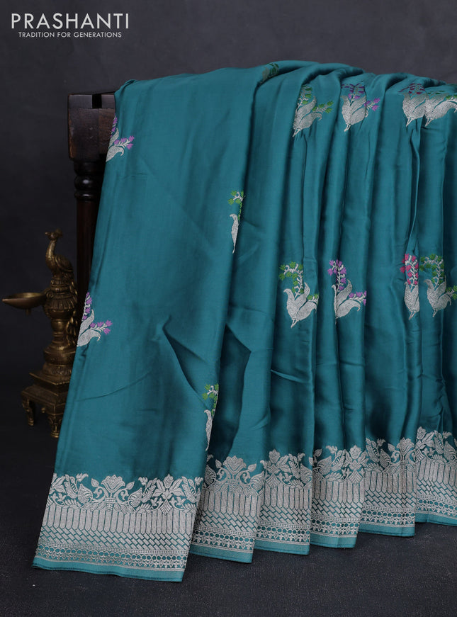 Art mushru silk saree teal blue shade with zari woven buttas and zari woven border