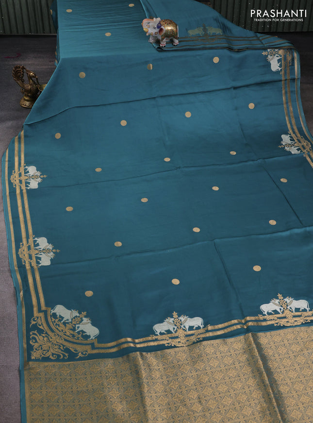 Art mushru silk saree peacock blue with zari woven coin buttas and zari woven border