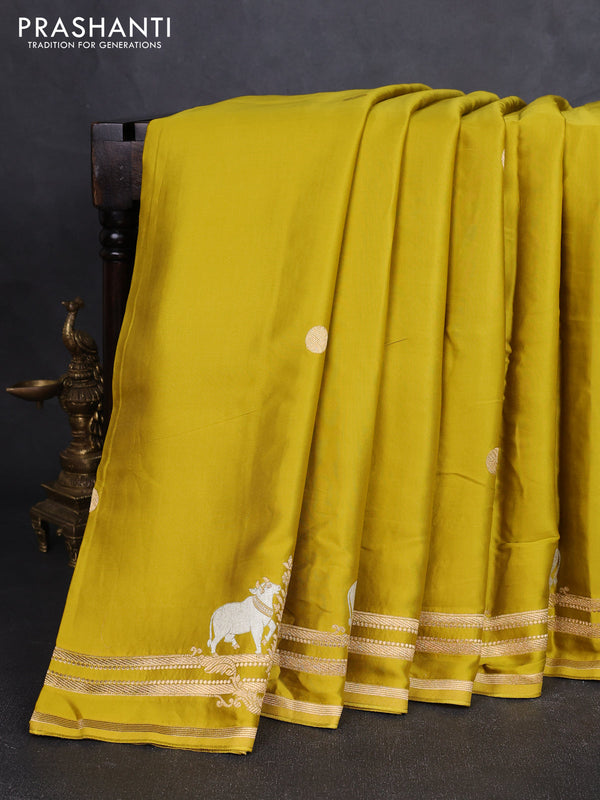 Art mushru silk saree mustard green with zari woven coin buttas and zari woven border