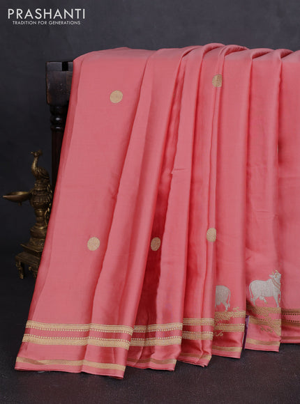 Art mushru silk saree peach shade with zari woven coin buttas and zari woven border