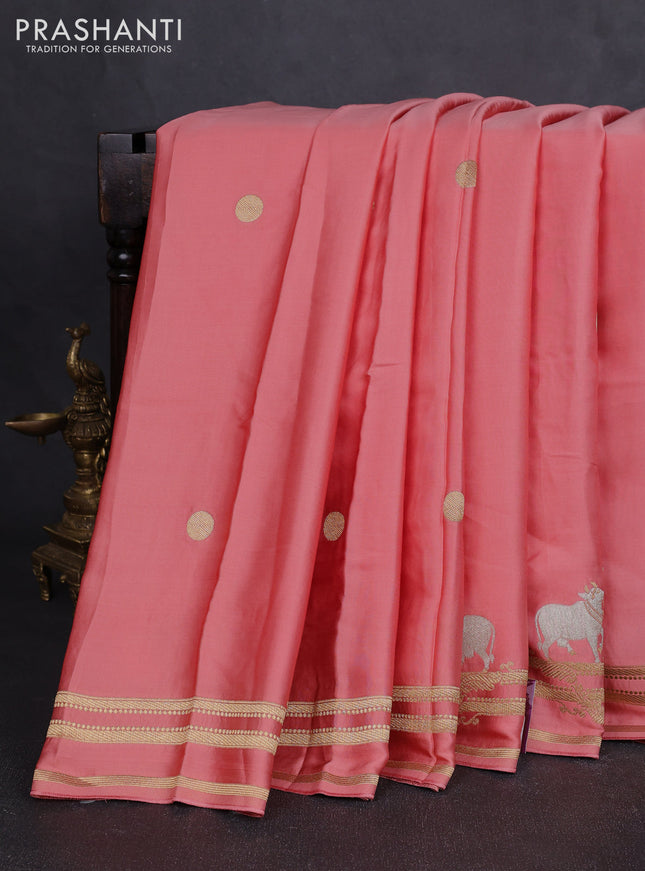 Art mushru silk saree peach shade with zari woven coin buttas and zari woven border