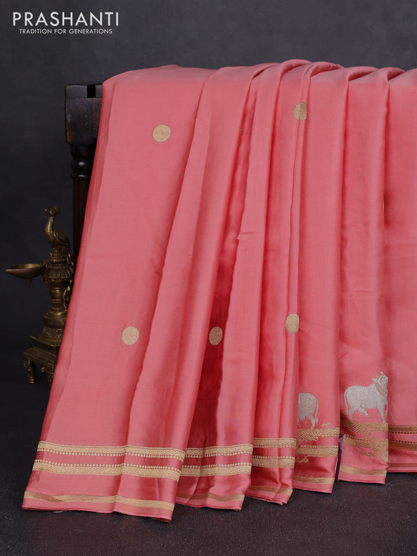Art mushru silk saree peach shade with zari woven coin buttas and zari woven border