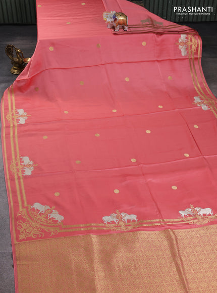 Art mushru silk saree peach shade with zari woven coin buttas and zari woven border