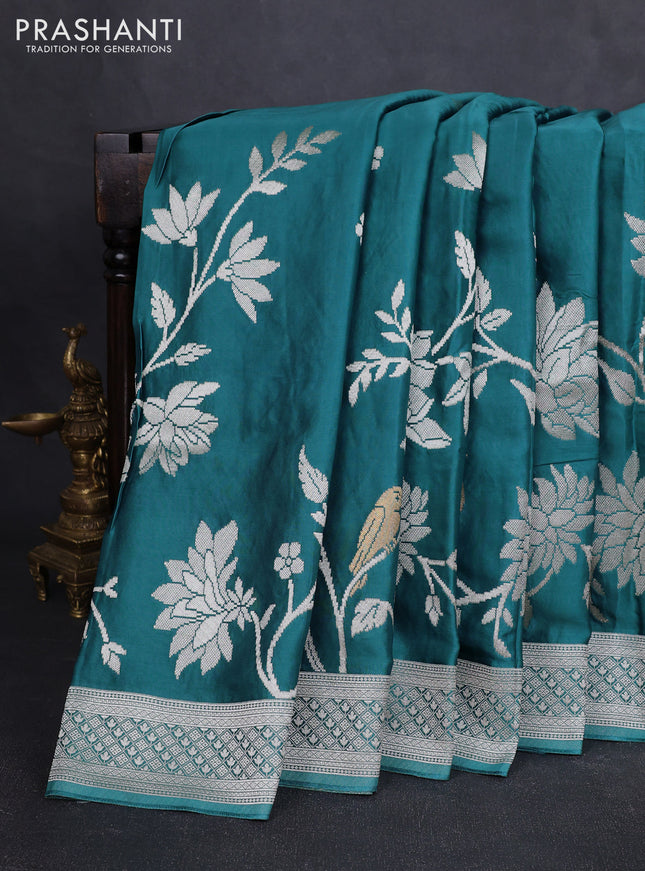 Art mushru silk saree teal blue shade with zari woven buttas and long zari woven border