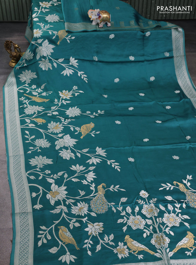 Art mushru silk saree teal blue shade with zari woven buttas and long zari woven border