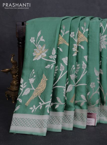Art mushru silk saree teal green with zari woven buttas and long zari woven border