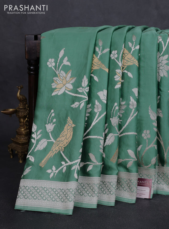 Art mushru silk saree teal green with zari woven buttas and long zari woven border