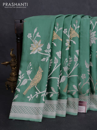 Art mushru silk saree teal green with zari woven buttas and long zari woven border