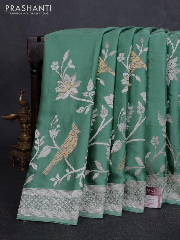 Art mushru silk saree teal green with zari woven buttas and long zari woven border