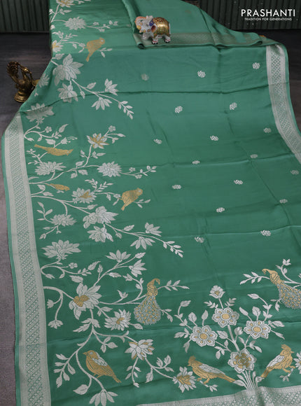 Art mushru silk saree teal green with zari woven buttas and long zari woven border